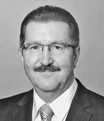 Staatssekretr Dr. Robert Kloos.