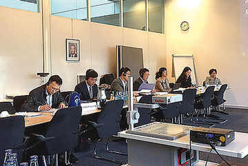 Die chinesische
Delegation bei
der Eingangsbesprechung